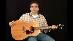 Holding the Guitar